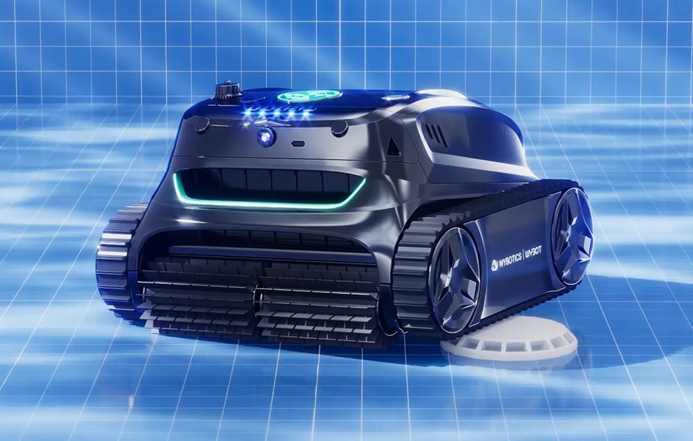 Bazénový robot Wybot pod vodou v bazénu s modrými dlaždicemi